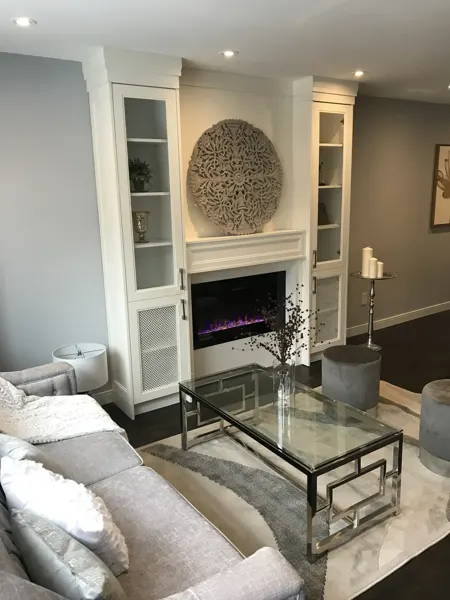 Finished fireplace and built-in shelves