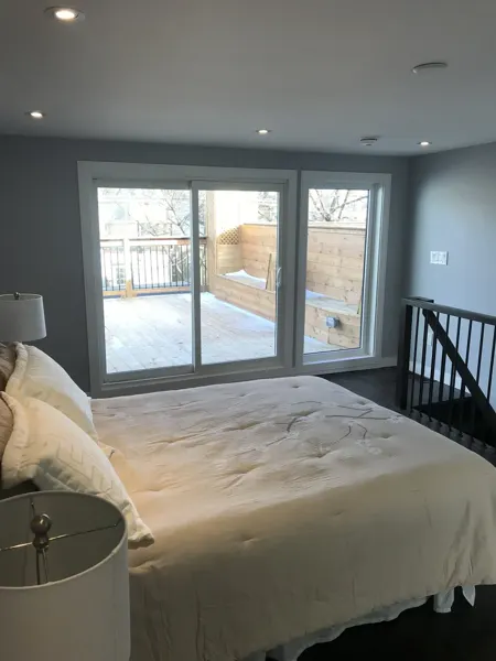 Finished bedroom opening onto the deck