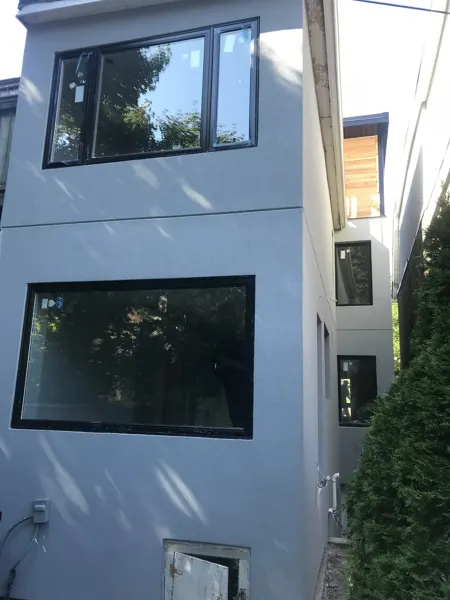 Rear cladding and windows with finishing work underway