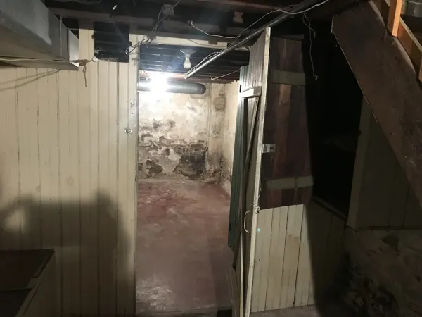 Original basement partitions and stairs