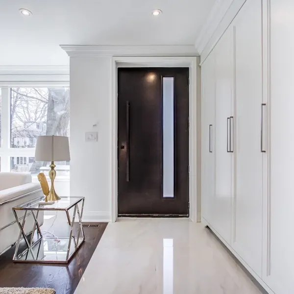 Completed entrance — new front door and built-in storage