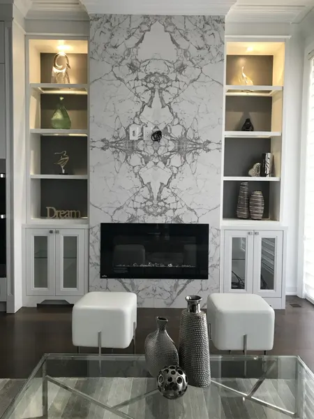 Completed kitchen fireplace — stone slab and display shelving