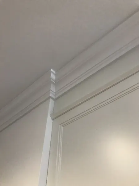 Kitchen cabinetry — crown moulding and upper cabinet detail