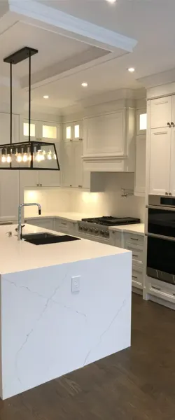 Completed kitchen — island and appliance wall close view