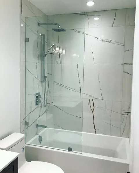 Completed bathroom — tub and overhead shower