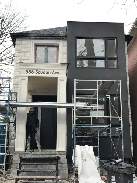 Front exterior — entrance finish work