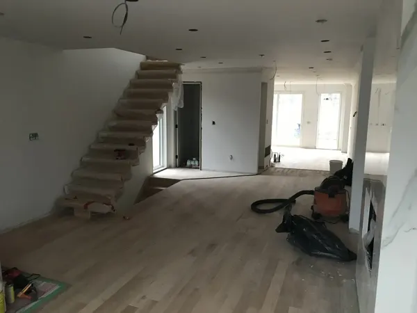 Main floor — new timber floor around the open staircase
