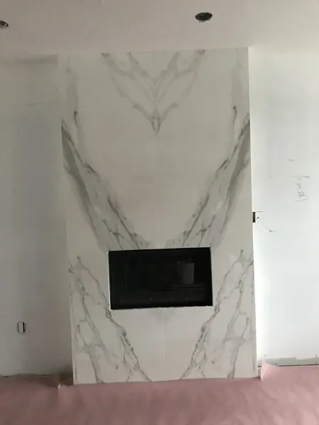 Living room — stone fireplace surround installation