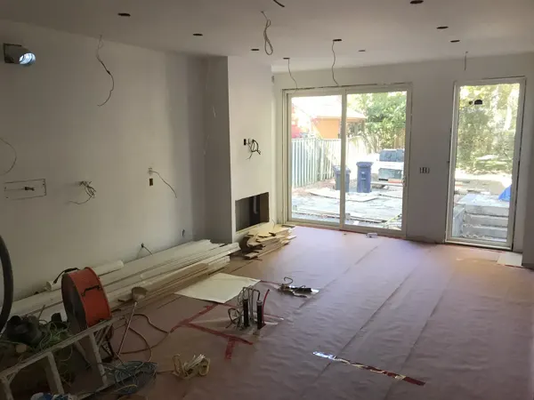 Kitchen — protected floor and rear doors during installation