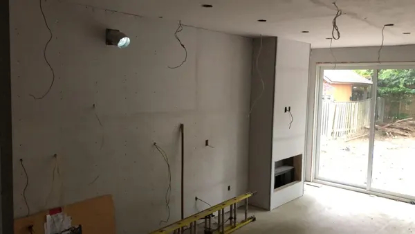 Kitchen — service rough-ins beside the rear opening