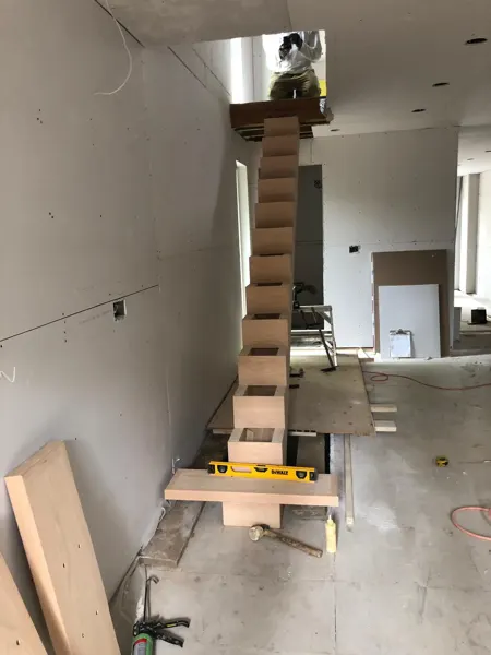 Staircase — timber stair installation from the lower flight