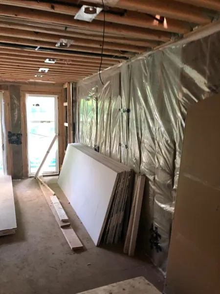 Interior — insulated wall and ceiling services before drywall