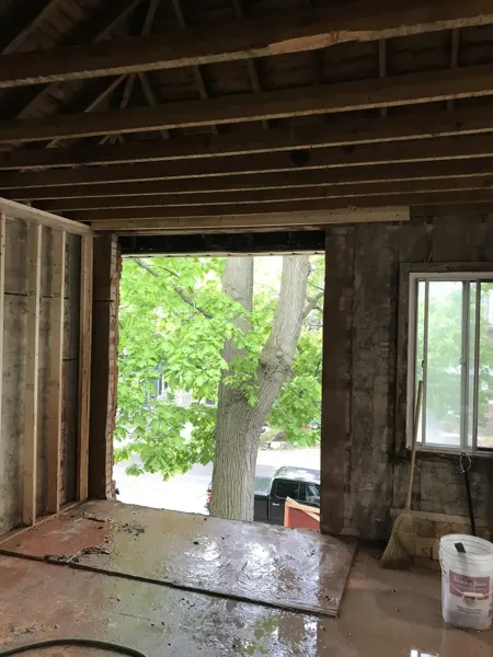 Upper floor — opened front wall and roof structure