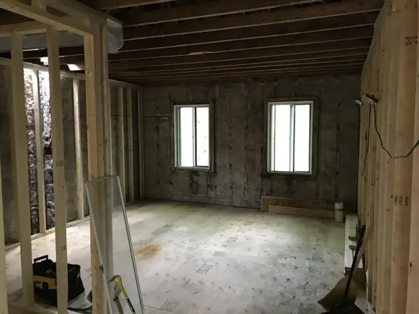 Upper floor — new partitions within the original masonry shell