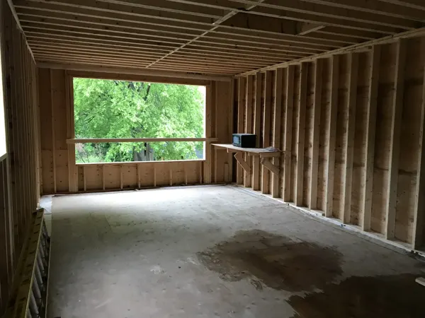 Rear addition — large rear window framing