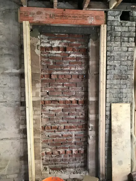 Structural work — masonry opening and new lintel