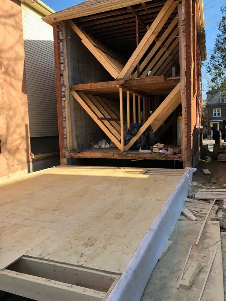 Rear addition — new floor deck at the supported opening