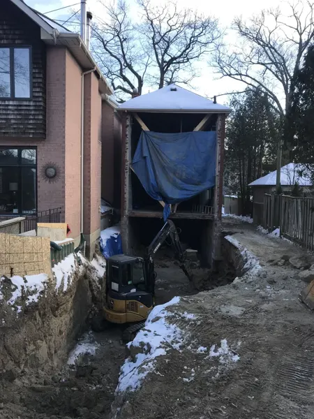 Rear addition — excavation beside the supported structure