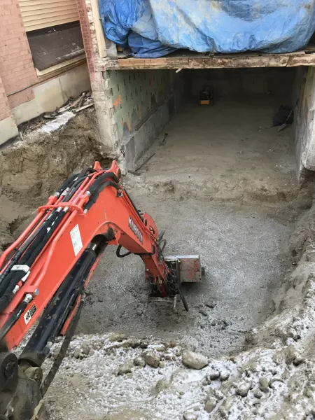 Rear addition — excavation below the original rear wall