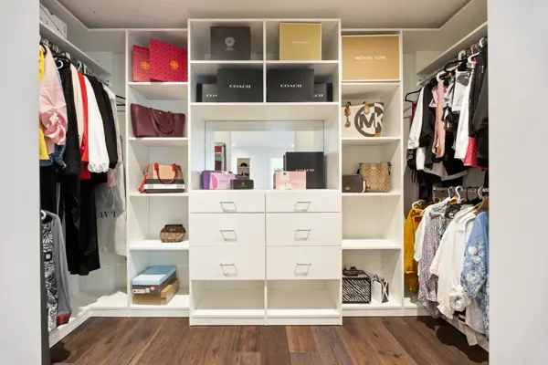 Finished walk-in closet storage and drawers