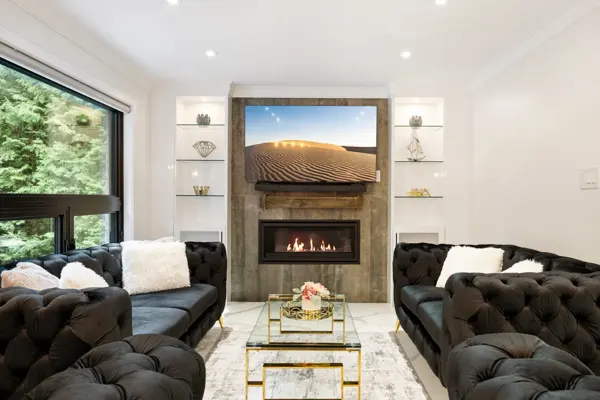 Completed living room fireplace and built-in shelves