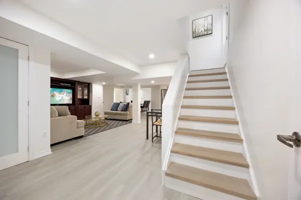 Completed basement living space and stairs