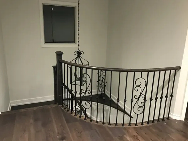 Finished upper landing and metal balustrade