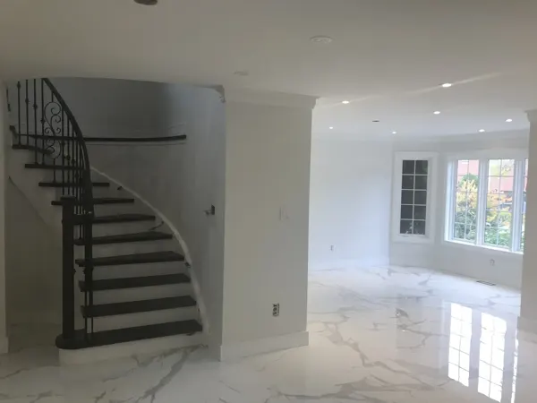Staircase and adjacent floor during electrical finishing
