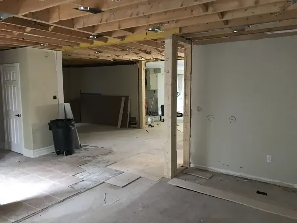Ceiling and partition demolition across the main floor