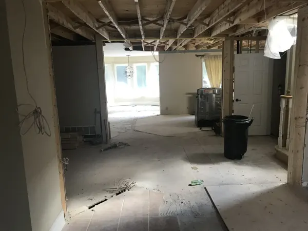 Main-floor structural and ceiling work toward the breakfast bay