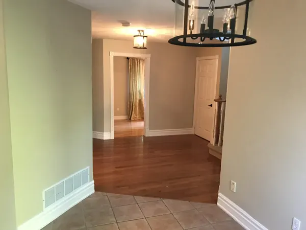 Existing main-floor circulation and timber flooring