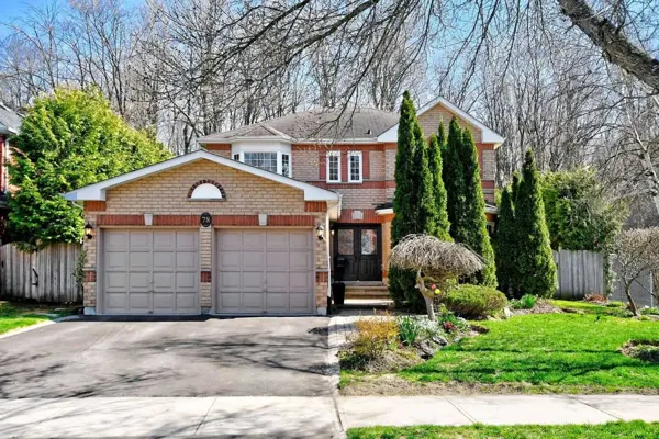 Original house exterior, garages and entrance