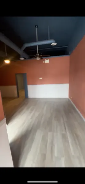 Existing orange-and-blue commercial interior