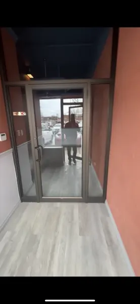 Existing glazed entrance vestibule