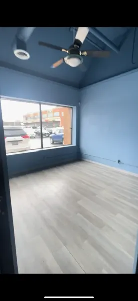 Existing front room and street-facing window