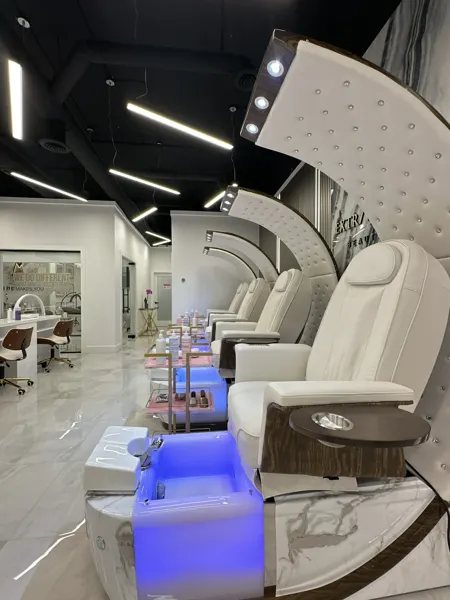Finished salon chairs and curved display wall