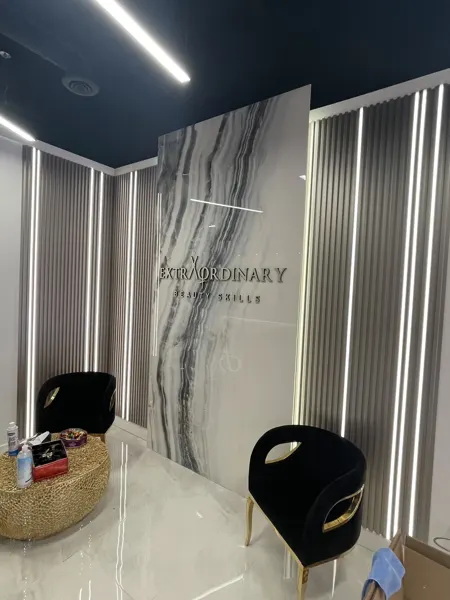 Finished illuminated feature wall and waiting chairs