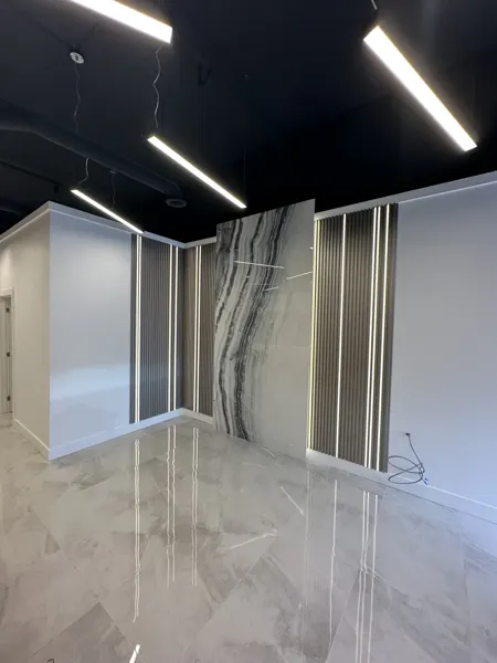 Reception feature wall before signage and remaining wiring were completed