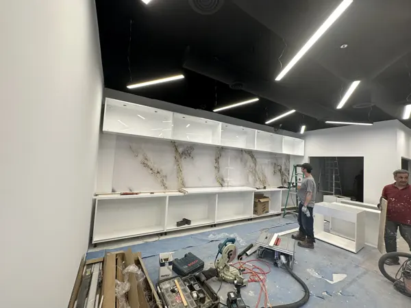 Service wall cabinets being fitted