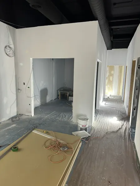 New room openings and priming under the painted exposed services