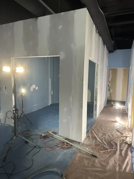 Treatment-room partitions and corridor before final finishes