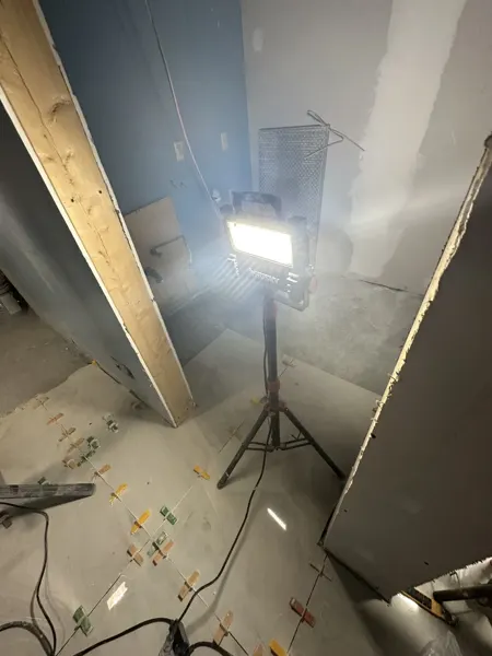 Back-room tile installation during the salon fit-out
