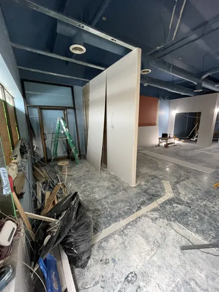 New entrance-side partition and wall boarding