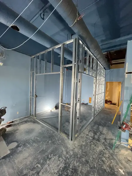 New treatment-room partition and doorway framing
