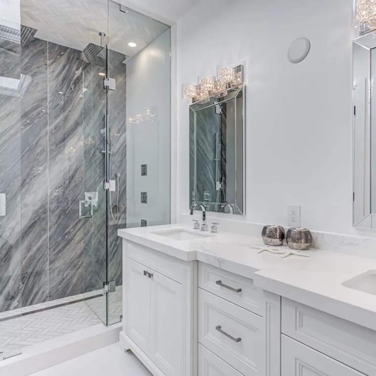 Completed bathroom — stone shower and double vanity