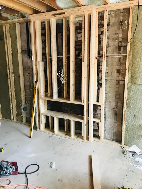 Interior — fireplace framing and electrical rough-ins