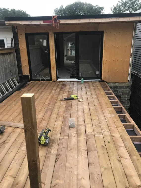 Rear deck boards and roof-level work in progress