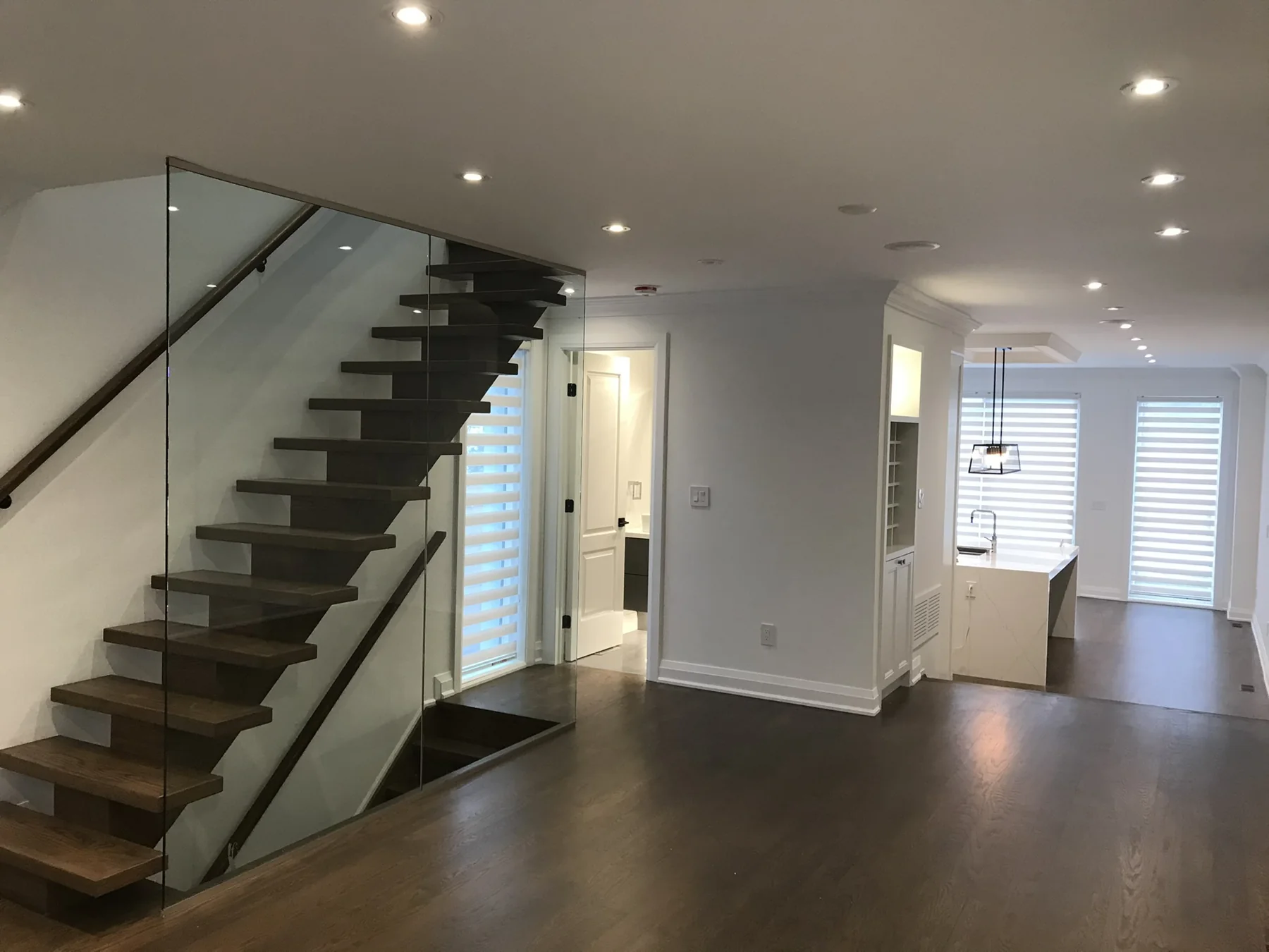 Completed open-plan living area and staircase