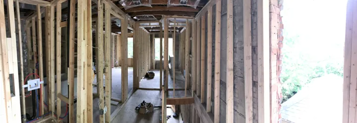 Upper landing — wall framing, plumbing and stair opening