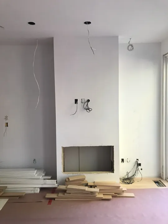 Living room — firebox opening and wall preparation